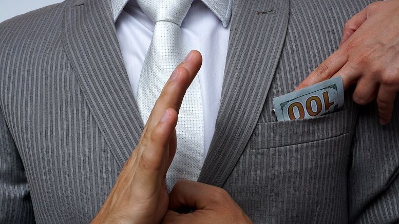 Pastor Charged With Taking Bribes from Defunct Bitcoin Exchange