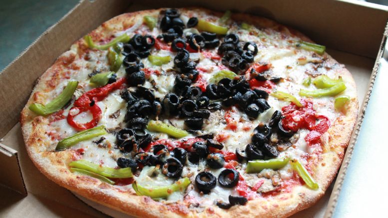 CryptoCoinsNews Celebrates Bitcoin Pizza Day