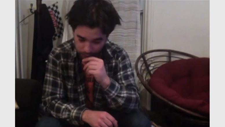 Bitcoin Enthusiast Loses Price Bet, Eats Hat