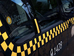 Taxi firms seek to drive bitcoin adoption