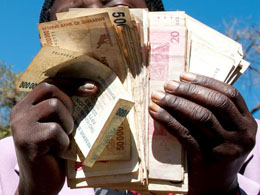 A Ten Trillion Dollar Bill from Zimbabwe Signed by Andreas Antonopoulos Is Being Auctioned For Charity